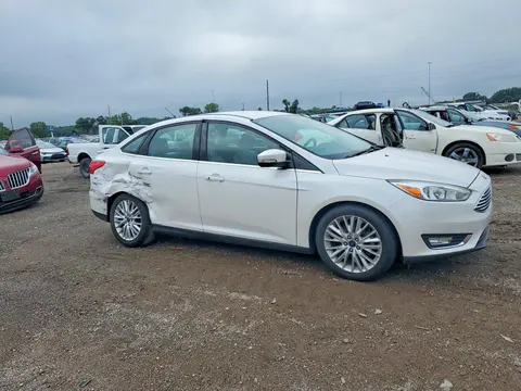 2015 Ford Focus VIN 1FADP3J28FL299913 фото 4