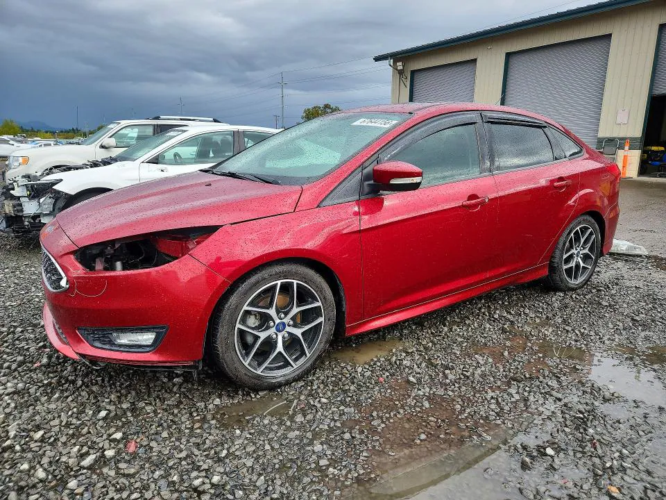 2015 Ford Focus VIN 1FADP3F2XFL369713 фото 1