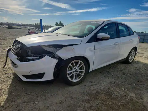 2015 Ford Focus VIN 1FADP3F2XFL329101 фото 1