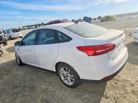 2015 Ford Focus VIN 1FADP3F2XFL329101 фото 2