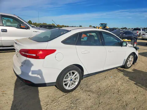 2015 Ford Focus VIN 1FADP3F2XFL329101 фото 3