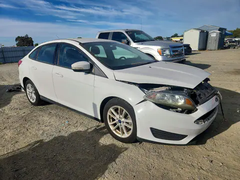 2015 Ford Focus VIN 1FADP3F2XFL329101 фото 4