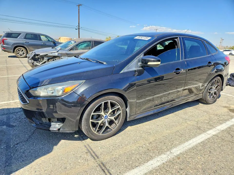 2015 Ford Focus VIN 1FADP3F27FL248993 фото 1