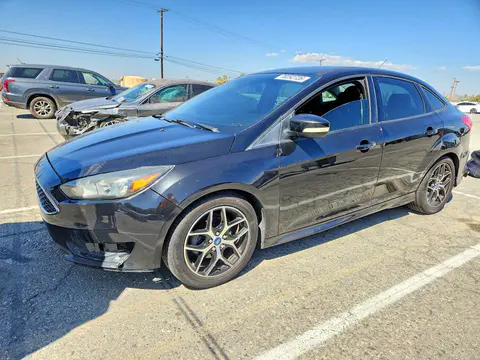 2015 Ford Focus VIN 1FADP3F27FL248993 фото 1