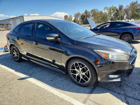 2015 Ford Focus VIN 1FADP3F27FL248993 фото 4