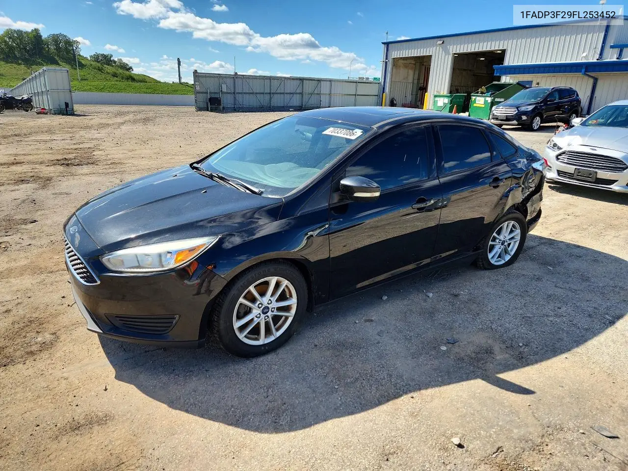 2015 Ford Focus 4D VIN 1FADP3F29FL253452 фото 1