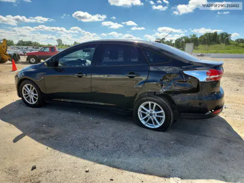 2015 Ford Focus 4D VIN 1FADP3F29FL253452 фото 2