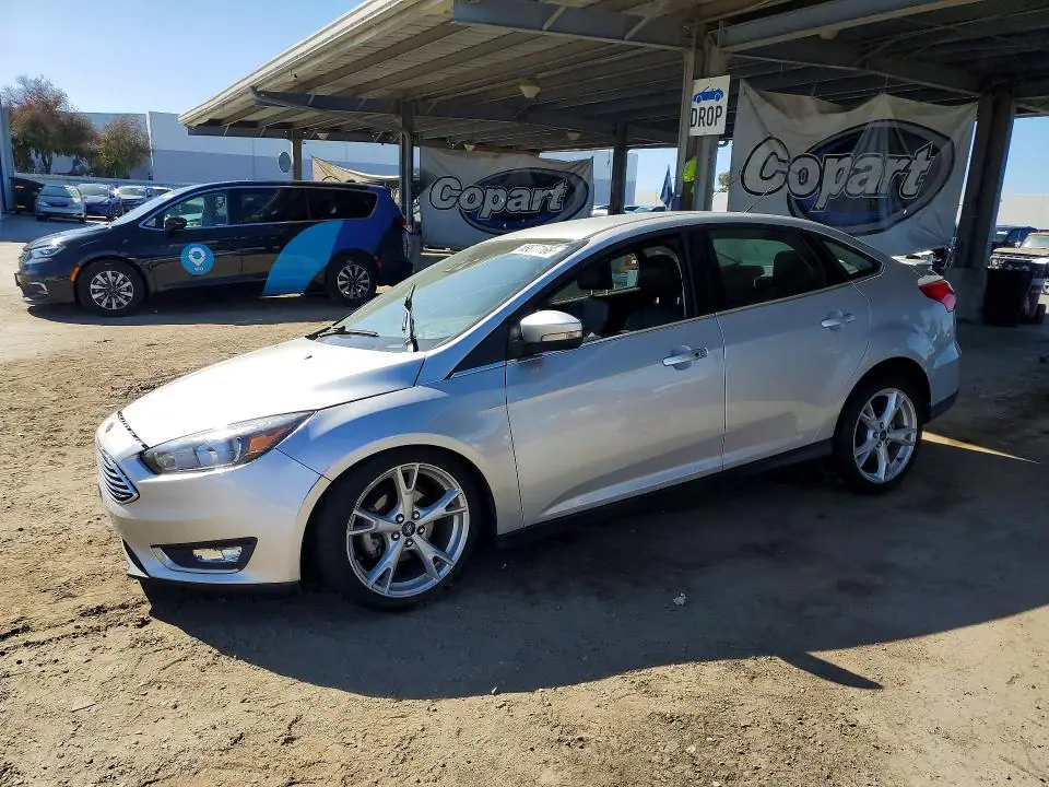 2016 Ford Focus VIN 1FADP3J22GL203520 фото 1