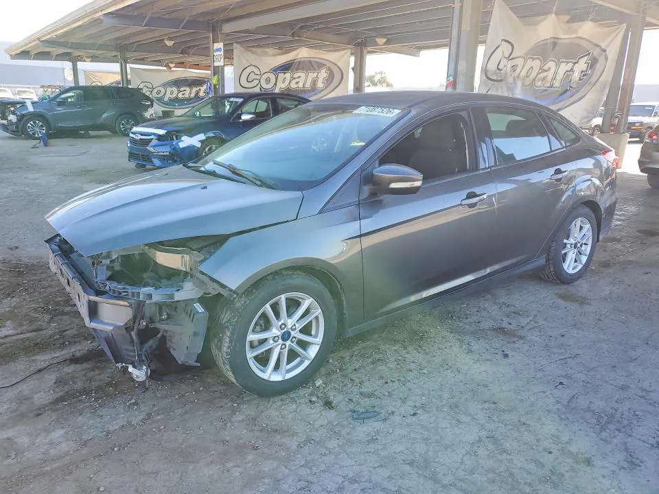 2016 Ford Focus VIN 1FADP3F27GL254634 фото 1