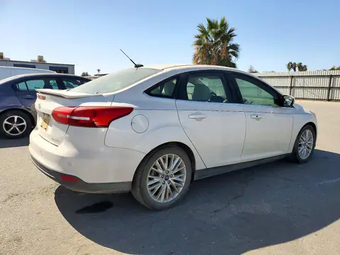 1FADP3J22HL260740 — 2017 Ford Focus, photo 3 from Copart 23.10.2026, Minor dents and scratches