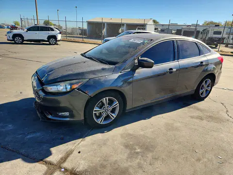 2018 Ford Focus VIN 1FADP3FE2JL288059 фото 1