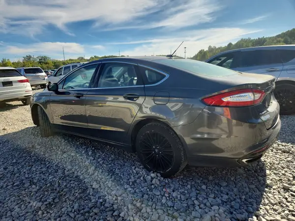 3FA6P0T94GR313679 — 2016 Ford Fusion, photo 2 from Copart 01.10.2026, Minor dents and scratches