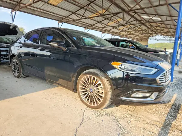 3FA6P0H99HR201194 — 2017 Ford Fusion, photo 4 from Copart, Rear end