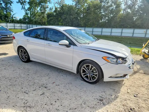 3FA6P0LU2HR393179 — 2017 Ford Fusion, zdjęcie 4 z Copart 06.10.2026, Przód