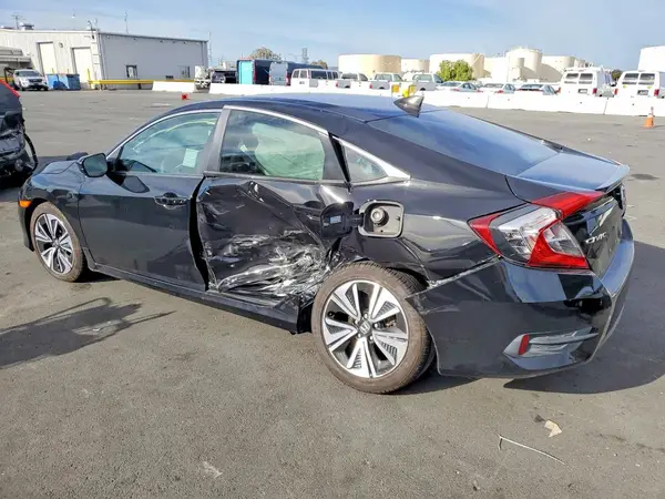 19XFC1F39HE205585 — 2017 Honda Civic, photo 2 from Copart 30.09.2026, Side
