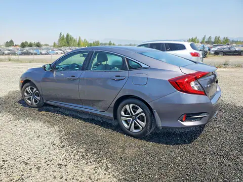2HGFC2F59JH608727 — 2018 Honda Civic, photo 2 from Copart 29.09.2026, Side