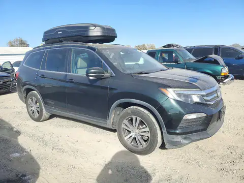 5FNYF6H66HB054512 — 2017 Honda Pilot, photo 4 from Copart 22.10.2026, Side