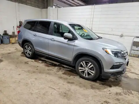 5FNYF6H38JB059741 — 2018 Honda Pilot, photo 4 from Copart 08.10.2026, Side