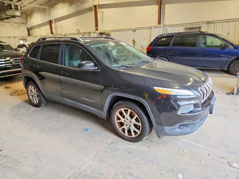 1C4PJLCSXEW288527 — 2014 Jeep Cherokee, photo 4 from Copart 21.10.2026, Minor dents and scratches