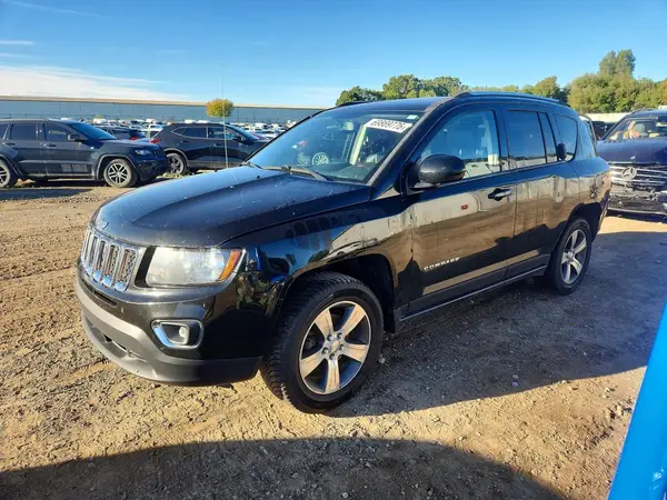 1C4NJDEB3GD809466 Jeep Compass 2016 — uszkodzenie Tył, zdjęcie przed naprawą