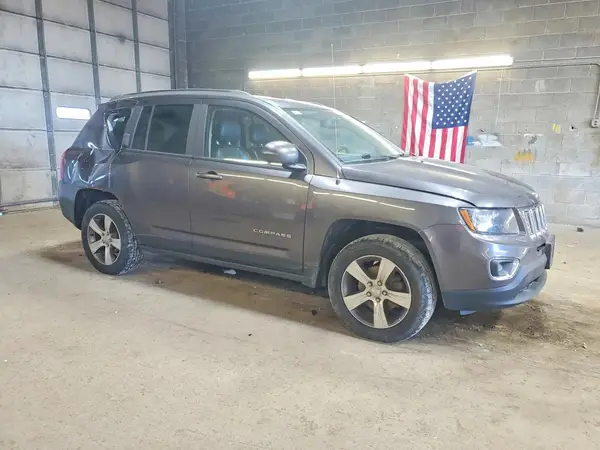 1C4NJDEB0GD708918 — 2016 Jeep Compass, photo 4 from Copart 28.09.2026, Flood