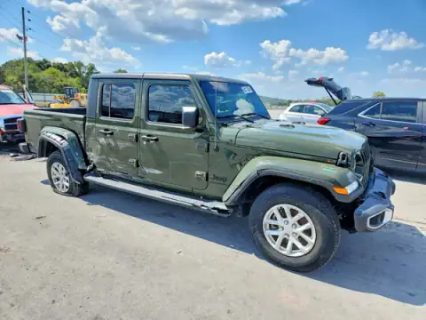1C6HJTAG4PL571987 — 2023 Jeep Gladiator, photo 4 from Copart 05.10.2026, Side