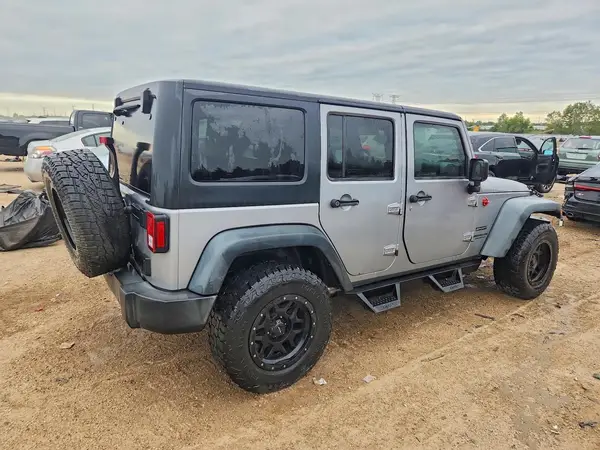 1C4HJWDG6GL200416 — 2016 Jeep Wrangler, photo 3 from Copart, Side