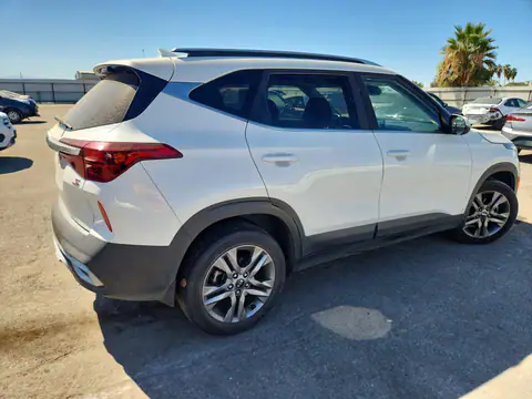 KNDEU2AAXM7080112 — 2021 Kia Seltos, photo 3 from Copart 23.10.2026, Front end