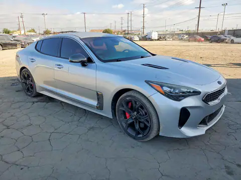 KNAE35LC3J6028984 — 2018 Kia Stinger, photo 4 from Copart 19.10.2026, Side