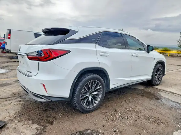 2T2BGMCA6GC007417 — 2016 Lexus RX, photo 3 from Copart, Side