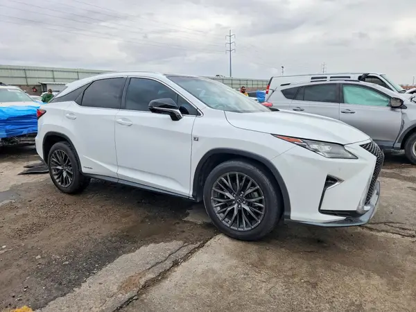 2T2BGMCA6GC007417 — 2016 Lexus RX, photo 4 from Copart, Side