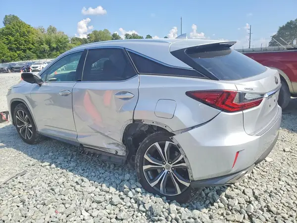 2T2BZMCAXHC104695 — 2017 Lexus RX, photo 2 from Copart 07.10.2026, Side