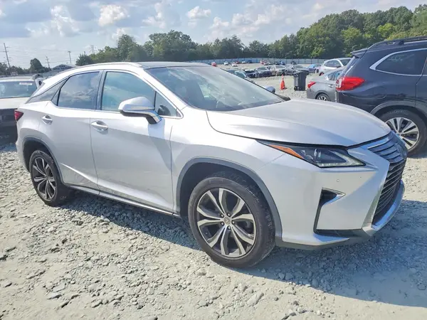 2T2BZMCAXHC104695 — 2017 Lexus RX, photo 4 from Copart 07.10.2026, Side