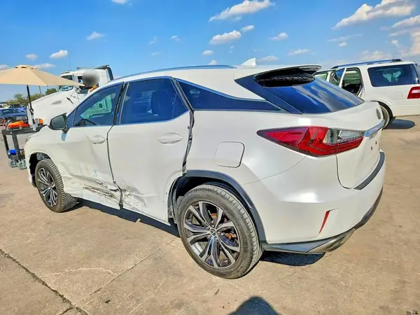 2T2ZZMCA5JC093674 — 2018 Lexus RX, photo 2 from Copart, Side