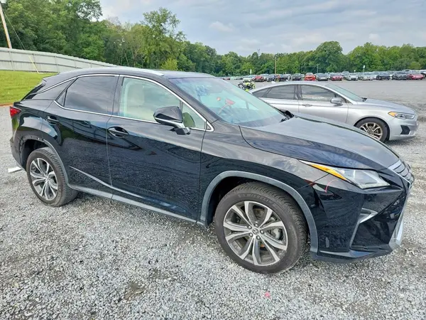 2T2BZMCA4KC179903 — 2019 Lexus RX, zdjęcie 4 z Copart, Bok