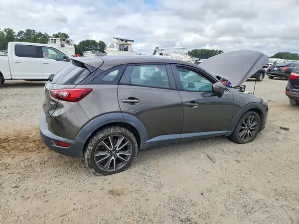 JM1DKFC72H0147908 — 2017 Mazda CX-3, photo 3 from Copart, Front end