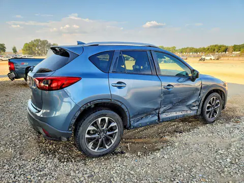 JM3KE4DY6G0864408 — 2016 Mazda CX-5, photo 3 from Copart 30.09.2026, Side