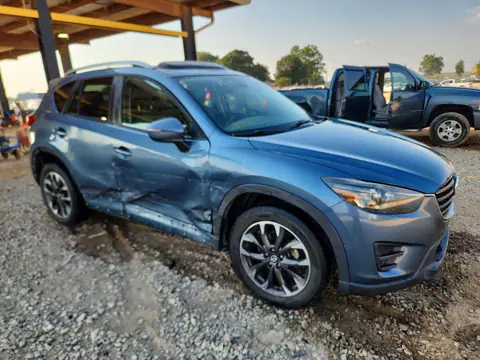 JM3KE4DY6G0864408 — 2016 Mazda CX-5, photo 4 from Copart 30.09.2026, Side