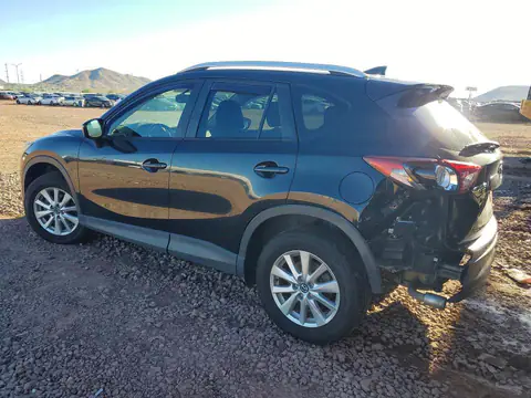 JM3KE2CY3G0601850 — 2016 Mazda CX-5, photo 2 from Copart 20.10.2026, Rear end