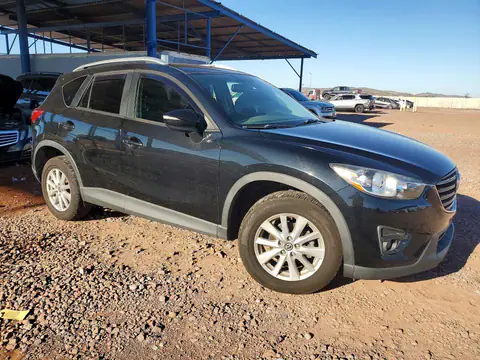 JM3KE2CY3G0601850 — 2016 Mazda CX-5, photo 4 from Copart 20.10.2026, Rear end