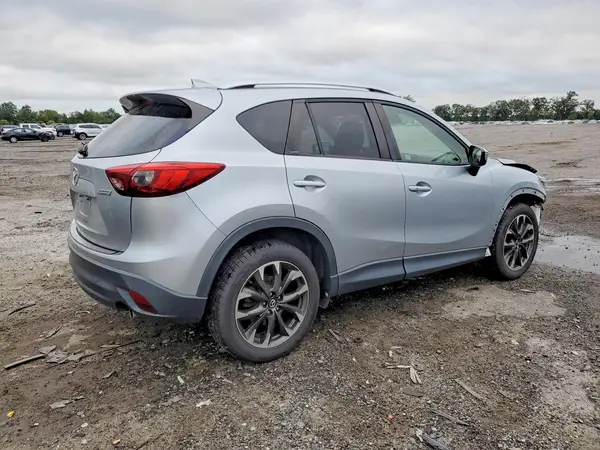 JM3KE4DY1G0703979 — 2016 Mazda CX-5, photo 3 from Copart, Front end