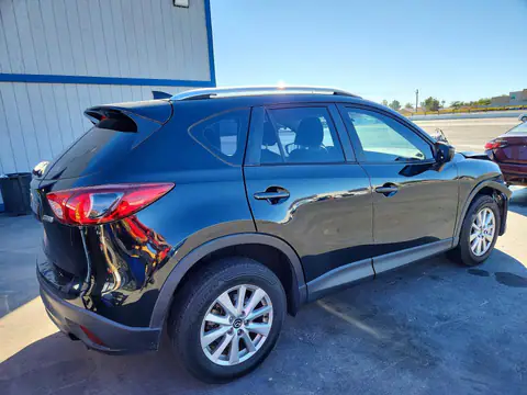 JM3KE2BY6G0786705 — 2016 Mazda CX-5, photo 3 from Copart 21.10.2026, Normal wear