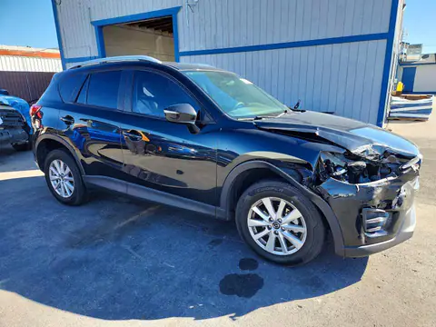 JM3KE2BY6G0786705 — 2016 Mazda CX-5, photo 4 from Copart 21.10.2026, Normal wear