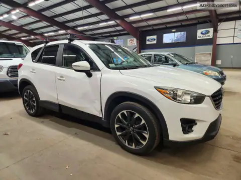 JM3KE4DY3G0715356 — 2016 Mazda CX-5, photo 4 from Copart 22.10.2026, Side