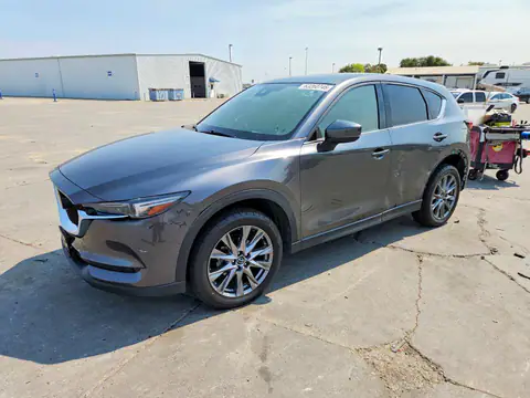 JM3KFBDM9M1499162 — 2021 Mazda CX-5, Interior fire (Burn - Interior), before-repair photos