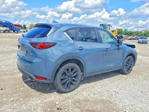 JM3KFBCM5M0370813 — 2021 Mazda CX-5, photo 3 from Copart 02.10.2026, Front end