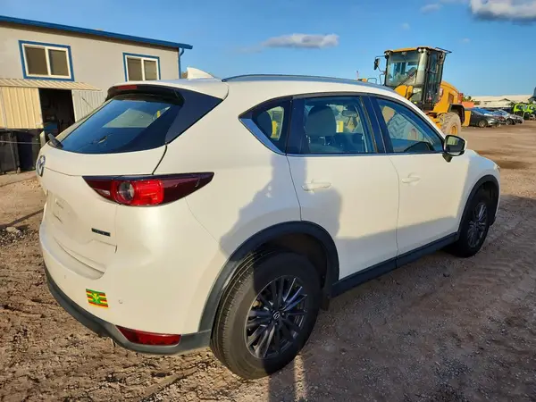 JM3KFABM3M0321928 — 2021 Mazda CX-5, photo 3 from Copart, Side
