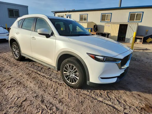 JM3KFABM3M0321928 — 2021 Mazda CX-5, photo 4 from Copart, Side