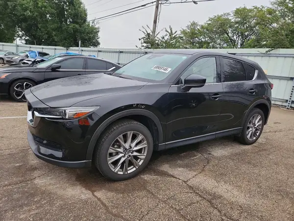 JM3KFBDMXM0421978 Mazda CX-5 2021 — Side damage, before-repair photo