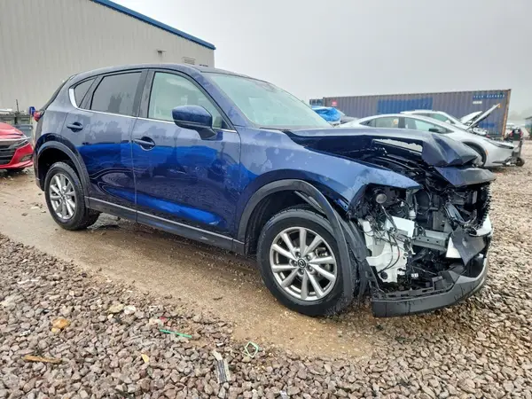 JM3KFBCM2P0169570 — 2023 Mazda CX-5, photo 4 from Copart, Front end